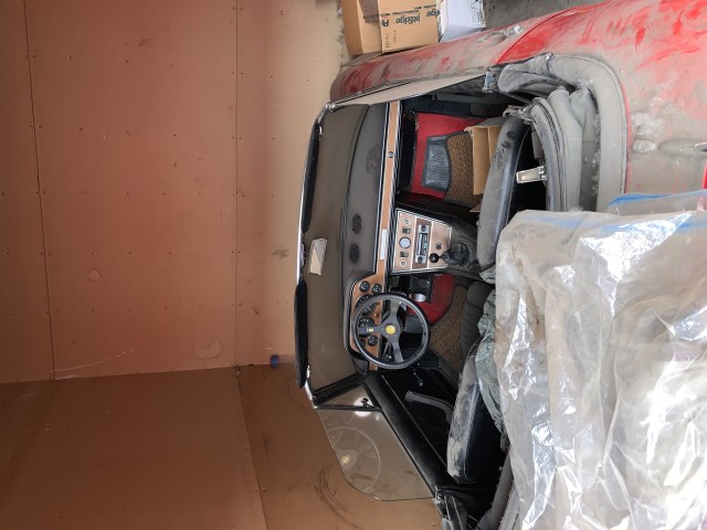Car went in with roof up, someone tried to steal it in the last 16 yrs and left the top down!
